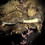 Silver sickle finger pendant