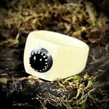 Carved human femur ring