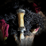 Human finger bone tooth pendant
