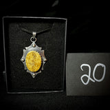 Item 20. Human skull cap pendant