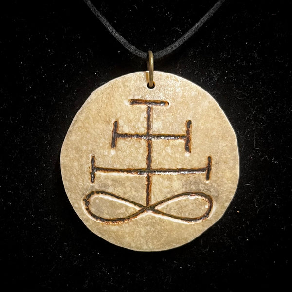 Leviathan cross burnt onto human  skull cap