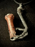 Item 13. Crows foot & finger pendant