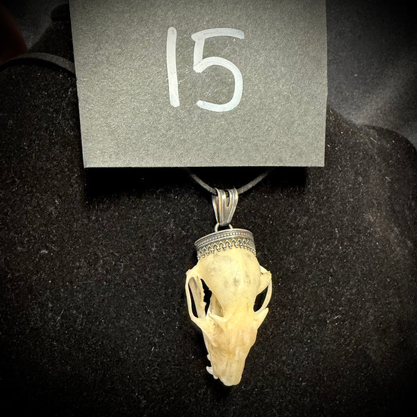 Item 15. Bat skull pendant