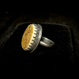 Item 24. Human skull cap ring