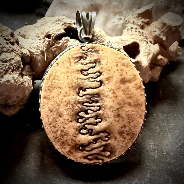 Human skull cap single suture pendant