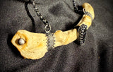 Item 6. Human rib vivianite necklace