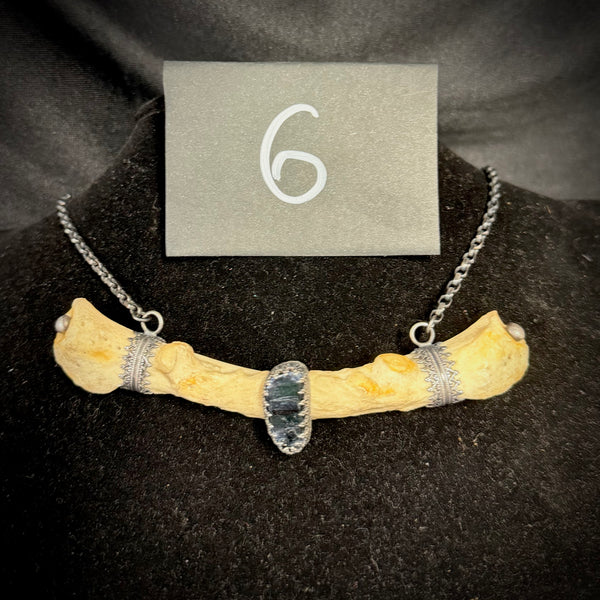 Item 6. Human rib vivianite necklace