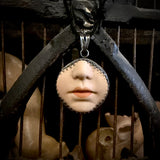 Doll face pendant