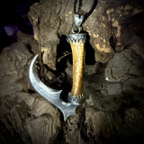 Silver scythe finger pendant
