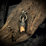 Dark human tooth silver pendant