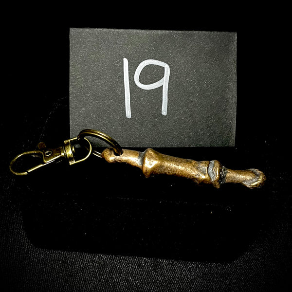 Item 19. Bronze cast finger keyring
