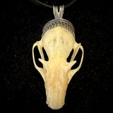 Item 15. Bat skull pendant