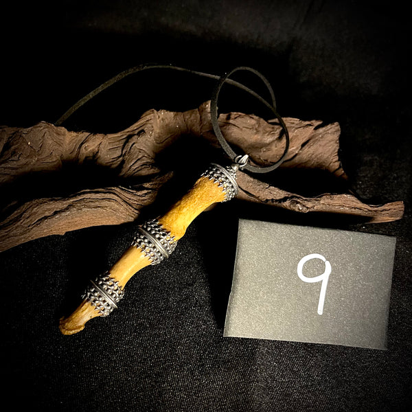 Item 9. Human finger triple gallery pendant