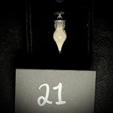 Item 21. Human cremains vial pendant