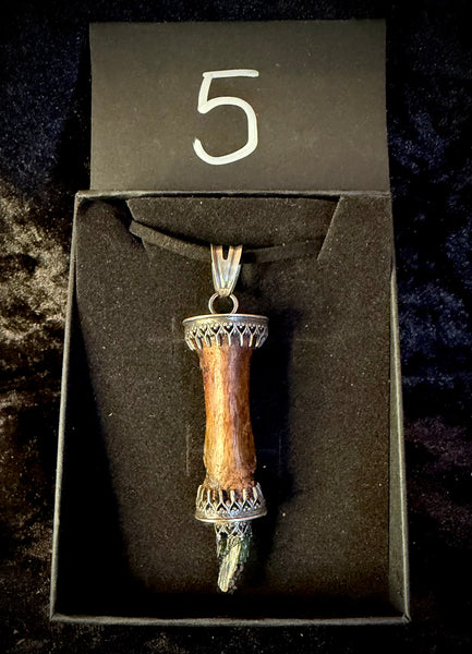 Item 5. Human finger vivianite pendant