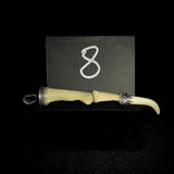 Item 8. Human finger claw pendant