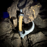 Silver scythe finger pendant