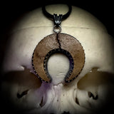 Skull cap moon pendant