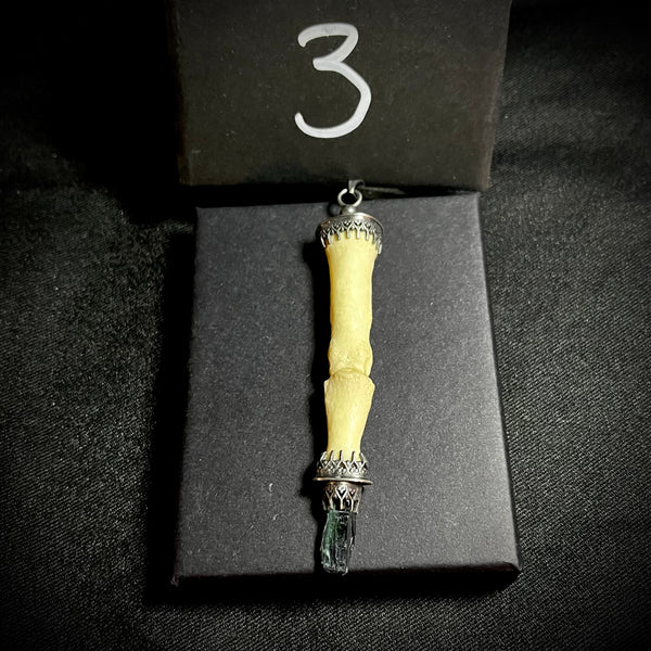 Item 3. Human finger vivianite pendant