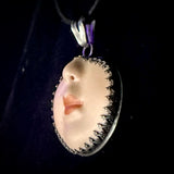 Doll face pendant