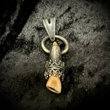 Dark human tooth silver pendant