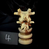 Item 4. Double human vertebrae stand