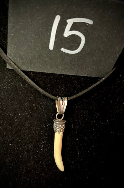 Item 15. Human femur ‘claw’ pendant