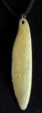 Item 11. Femur wing pendant