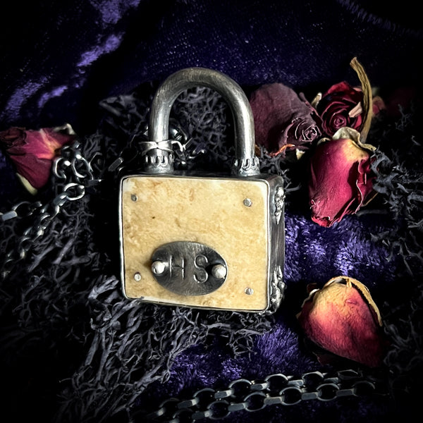Human skull cap padlock necklace