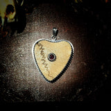 Broken heart suture pendant