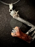 Item 13. Crows foot & finger pendant