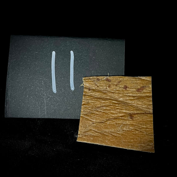 Item 11. A piece of human leather