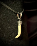 Item 15. Human femur ‘claw’ pendant
