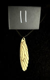 Item 11. Femur wing pendant