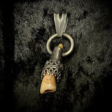 Dark human tooth silver pendant