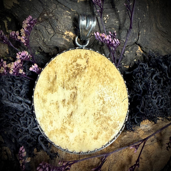 Human skull cap pendant