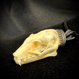 Item 15. Bat skull pendant