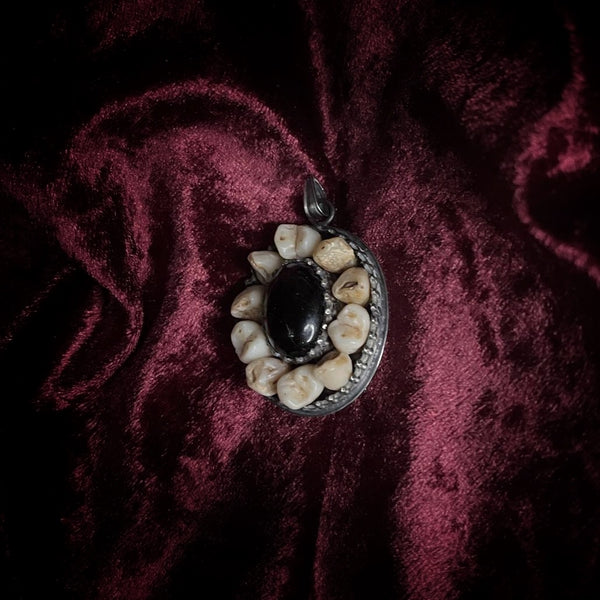 Human Teeth and Onyx Pendant