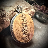 Human skull cap single suture pendant