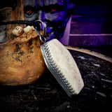 Skull cap coffin pendant