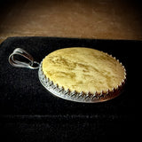 Item 5. Human skull cap pendant