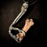 Item 13. Crows foot & finger pendant