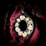 Human Teeth and Onyx Pendant