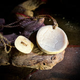 Human skull cap carved pendant