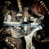 Human skull cap silver crucifix pendant