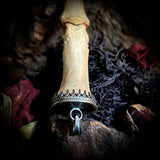 Double finger bone tooth pendant