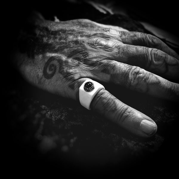 Carved human femur ring
