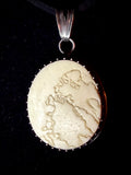Item 15. Skull cap suture pendant