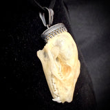Item 15. Bat skull pendant