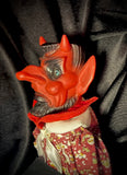Item 17. Devil doll